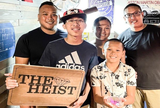 Image of escape room participants - teen birthday parties in Boston.