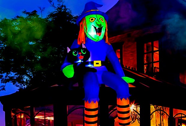 Cute Halloween inflatable witch sits on your roof with her black cat.  Photo from the Rocinha store on Amazon