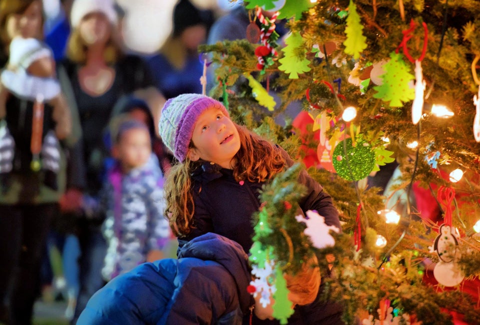 Kids help trim the tree at the Roslindale Tree Lighting. Photo courtesy of Roslindale Village Main Street