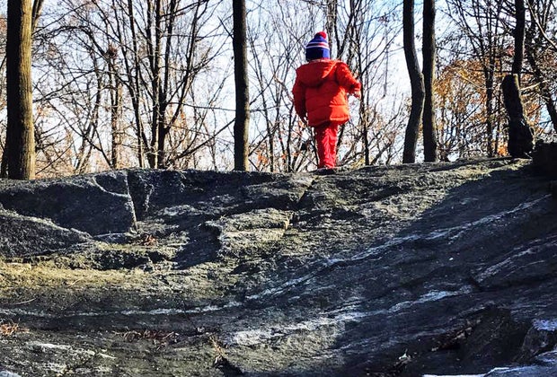 child walking in the woods Rye Nature Center westchester winter walks