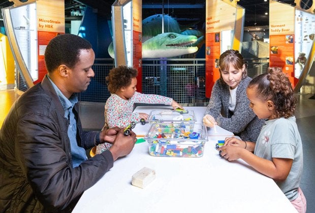 Image of family at ECHO Leahy Center - New England Science Museums