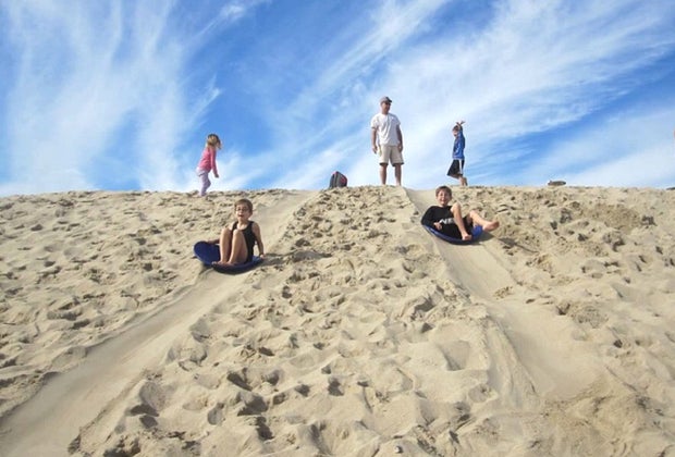Sand berm sledding by the beach in LA