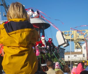 You'll know Christmas 2025 is coming when Santa arrives by tugboat in Mystic! Photo by Ben And Sam via Flickr 2.0