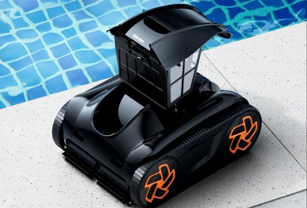 iGarden Pool cleaner sitting next to a sparkling pool it just cleaned