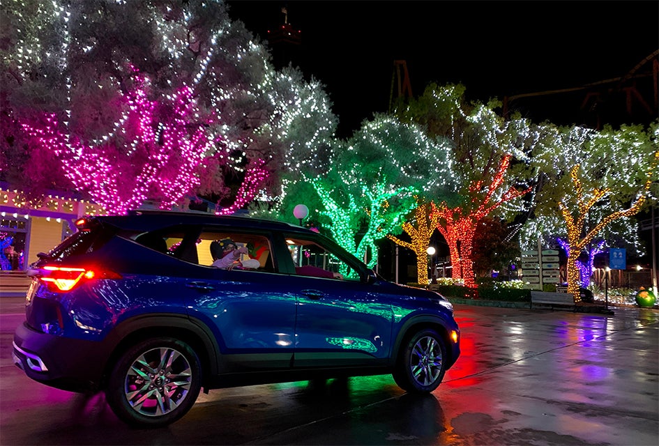 Six Flags Holiday in the Park Drive-Thru features more than a million dazzling lights, festive holiday themes, and a seasonal soundtrack.