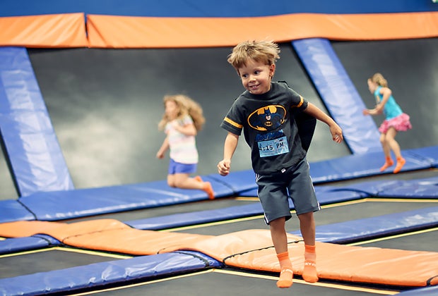 child on trampoline at sky zone