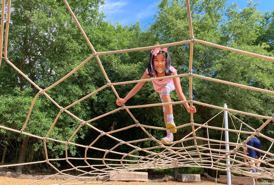 Climbing the spiderweb. Photo by Vicki Li Yip
