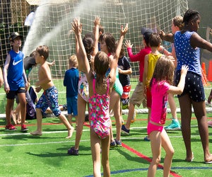 Come out and play at Sprinkler Day at Asphalt Green. Photo courtesy of Asphalt Green