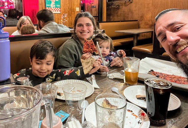 Photo of family eating pizza - Train Rides for Connecticut Kids
