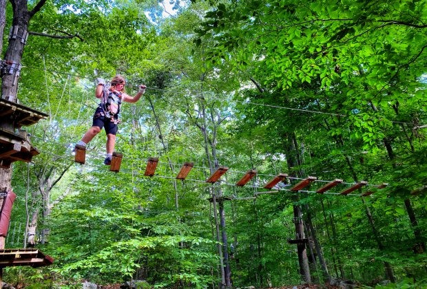 Let the kids test their bravery with an Adventure Park challenge on a CT day trip. Photo by Ally Noel
