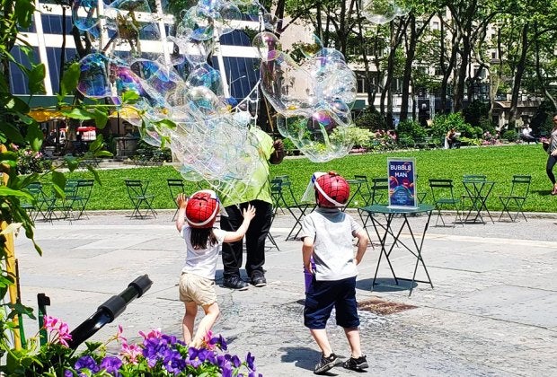  Open your eyes to the magical world of bubbles with Bubble Man at Bryant Park. Photo courtesy of Bryant Park