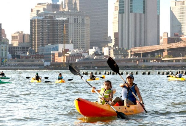 Glide along the water while kayaking with the Brooklyn Bridge Park Boathouse. Photo by Etienne  Frossard