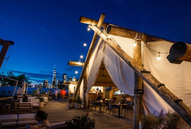 Collective Governors Island elevates the camping experience with sturdy tents, luxurious bedding, and indoor plumbing. Photo courtesy Collective Governors Island