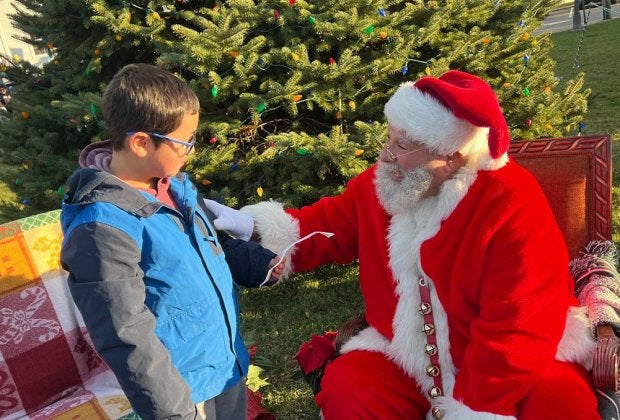 Santa Claus is coming to town, for breakfast, brunch, and photos with Santa in CT! Photo by Anne Ogden for the Mystick Chamber of Commerce.