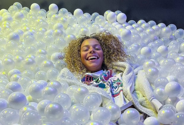 Diving into a ball pit will make any kid smile!