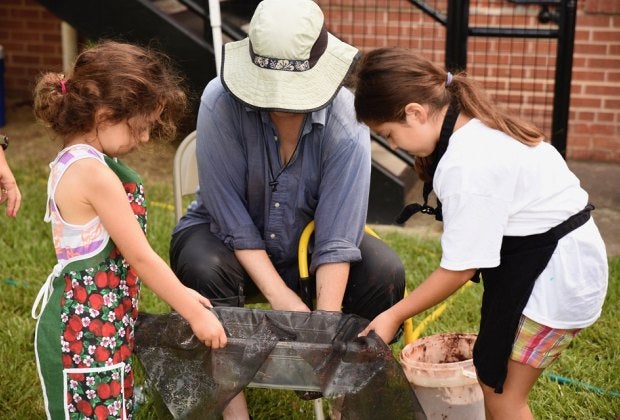 Budding paleontologists are invited to search for bone fragments during the Museum's Fossil Wash. Photo courtesy of Houston Museum of Natural Science.