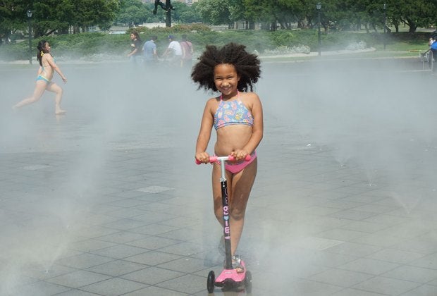 The kid-friendly splash pad at the Fountain of the Fairs is made even sweeter when the ice cream truck cruises by. 