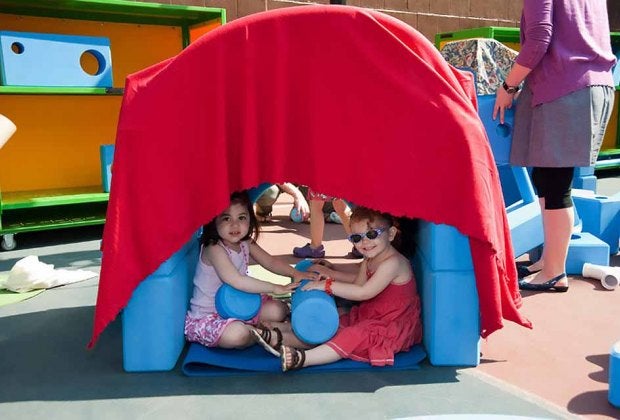Play with sand, water, or the big blue blocks at the Imagination Playground. Photo courtesy NYC Parks