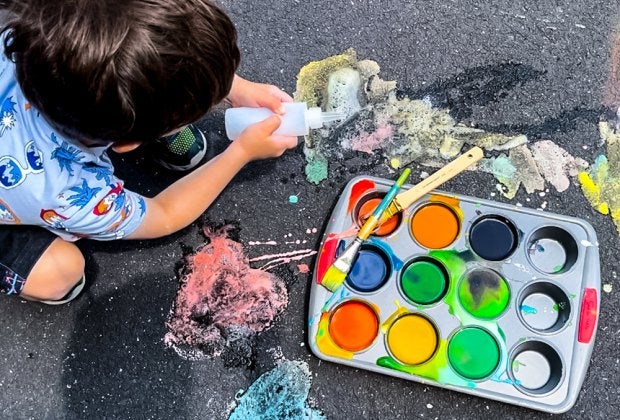 Bring an explosion of color to your driveway with this homemade fizzy sidewalk chalk paint. Photo by author Liz Baill