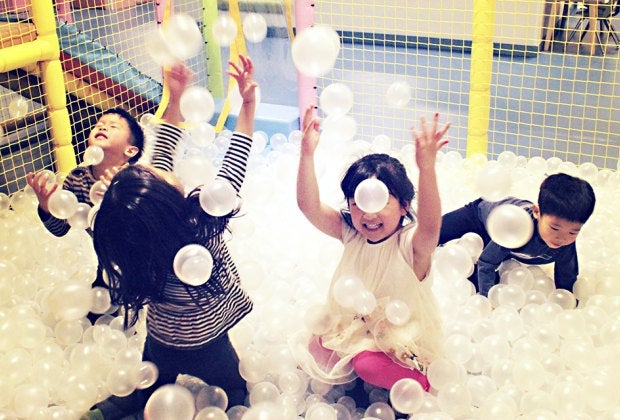 Watch kids have a blast in the bubble ball area at Lily and Liam while you sit nearby sipping coffee.