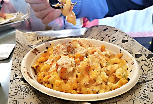 Dig into a hearty bowl of the signature dish at I Heart Mac and Cheese.
