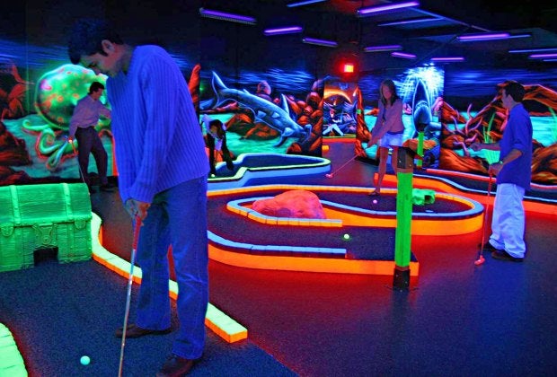 Play mini golf by black light! Photo courtesy of Main Event