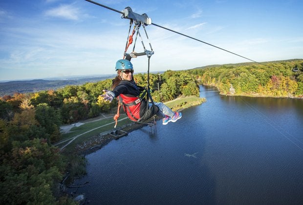 Mountain Creek provides an unrivaled view from above the fall leaves by taking a ride along its zipline course. Photo courtesy of Mountain Creek