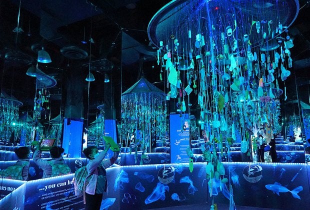 Looks can be deceiving at Arcadia Earth, where this sparkling kaleidoscope of colors is, in fact, a collection of plastic waste and a lesson in environmental conservation. 