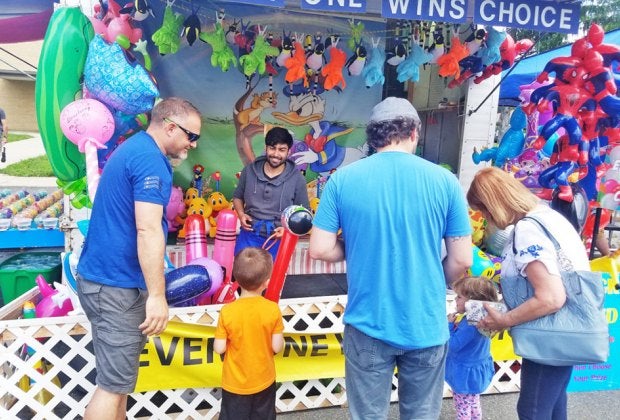 The Ridgefield Park Music Fest Street Fair has lots to see and do, including music, food, games, and rides. Photo courtesy of JC Promotions