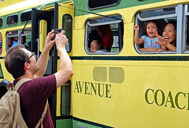 All aboard for a day of fun when vintage transit vehicles take over Brooklyn Bridge Park for the New York Transit Museum's annual bus festival. Photo courtesy of the museum