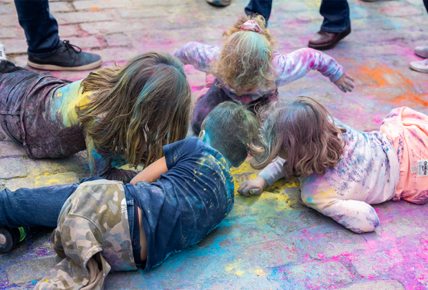 Shake off the winter blues and douse your family in the colors of spring at the Holi Celebration at the South Street Seaport. Photo by Mike Szpot
