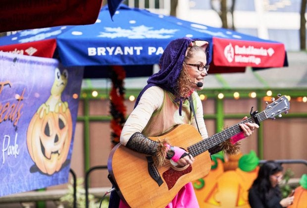 Join the Halloween party at Bryant Park to enjoy eerie magic tricks, face painting, arts & crafts, and spooky stories. Photo by Angelito Jusay