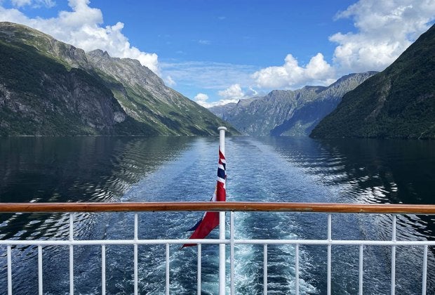 Take a scenic boat ride through the breathtaking fjords. 
