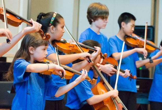 Music classes give Boston kids the chance to express themselves creatively, and focus on learning to do something they love. Photo courtesy of Powers Music School