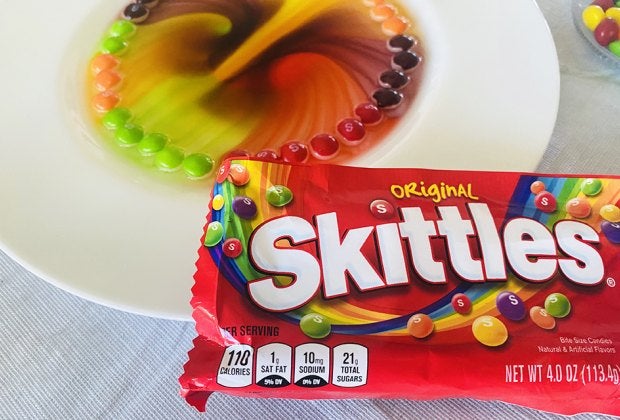Check out what a little warm water does to these Skittles.