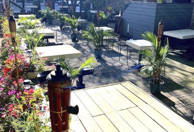 The Royal Grocer is a Bucktown neighborhood family-friendly restaurant (with tiki torches)!