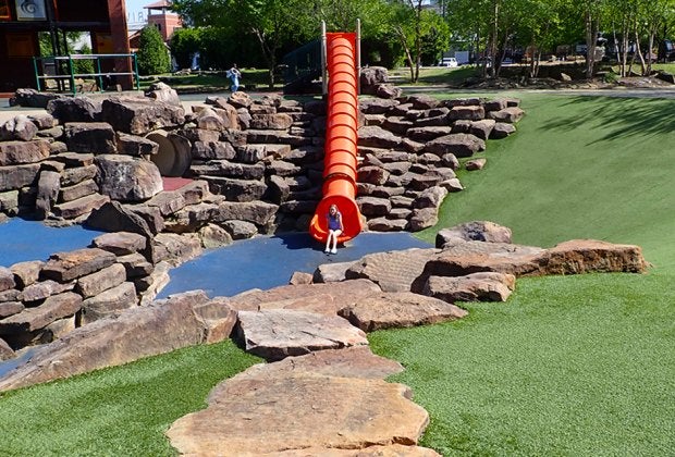 Kids will have the time of their lives on the giant slide at Riverfront Park. 