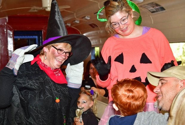 Have no fear: Those are friendly witches aboard Wilmington & Western Railroad's Halloween Express. Photo by Mike Ciosek