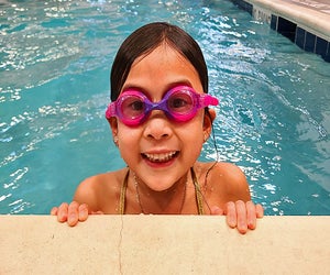 At AquaBeba, swimming lessons are designed by a former Olympian to get kids comfortable in the water and keep them safe. Photo courtesy of AquaBeba