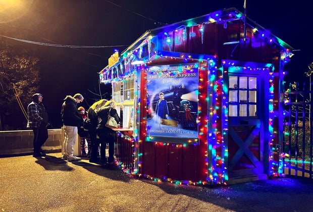 Christmas lights abound during your Polar Express journey. Even the ticket booth is decorated.
