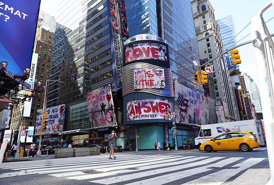 Times Square is more quiet than normal, but still filled with lively billboards and plenty of attractions. 