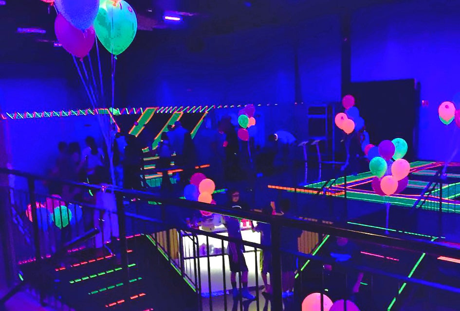 Throw a birthday party with glow-in-the-dark trampoline time at Bounce! in  Valley Cottage. Photo courtesy of the venue